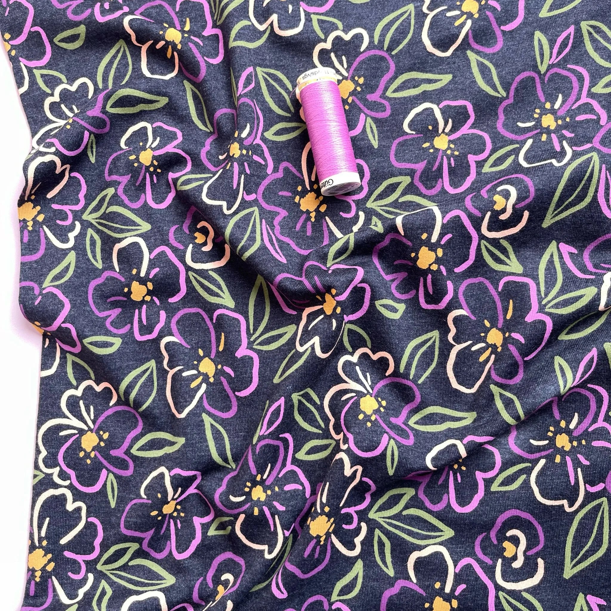 Floral Outline on Dark Grey Melange Jersey Fabric